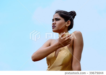 Young woman posing close-up Young woman posing close-up 39679844