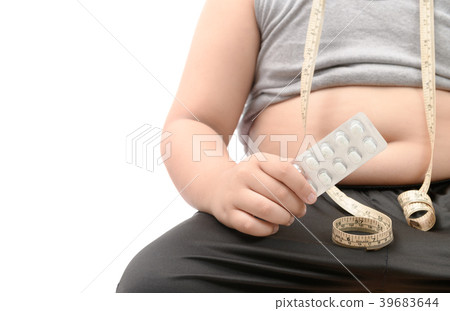 fat boy with obese belly taking slimming pills 39683644