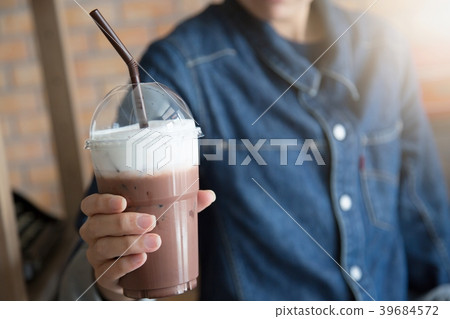 A young woman in a denim jacket 39684572