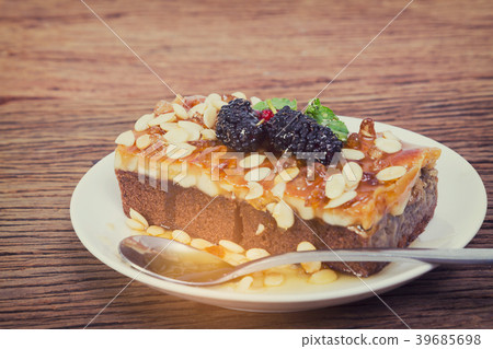 Delicious homemade toffee cake with mulberry  39685698
