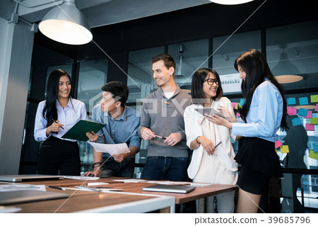 Young modern people planning business strategy. Young modern people planning business strategy. 39685796