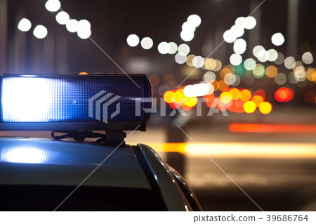Police car at night, lights flashing in Seoul Police car at night, lights flashing in Seoul 39686764