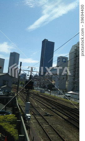 Blue sky and skyscrapers on the track 39694400