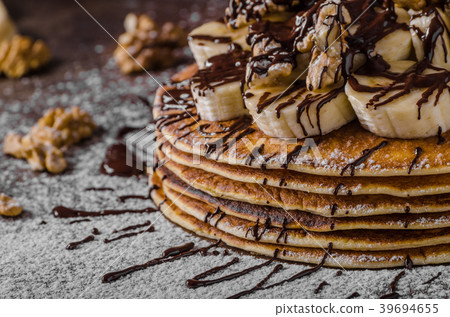 Rustic pancakes with banana 39694655