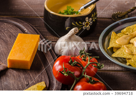 Nachos with homemade cheese dip Nachos with homemade cheese dip 39694718