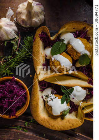 Falafel with herbs and cabbage 39694771