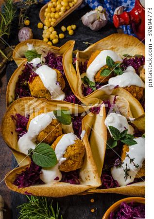 Falafel with herbs and cabbage 39694773