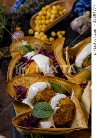 Falafel with herbs and cabbage 39694777