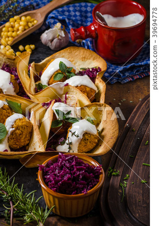 Falafel with herbs and cabbage 39694778