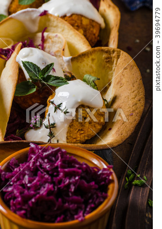 Falafel with herbs and cabbage 39694779