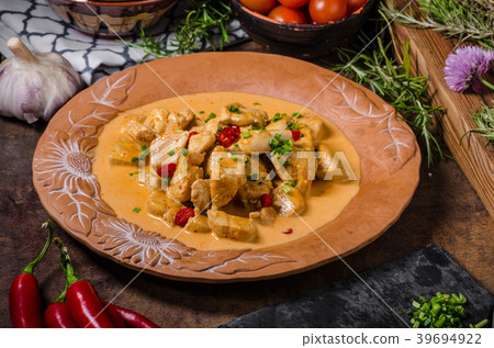 Chicken curry with herbs 39694922