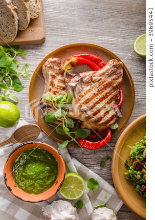 Grilled Pork Chops, risotto with portobello Grilled Pork Chops, risotto with portobello 39695441