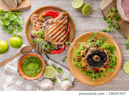 Grilled Pork Chops, risotto with portobello 39695447