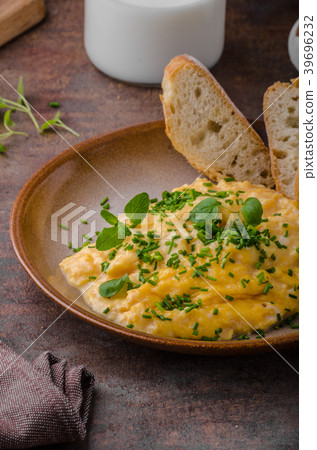 Scrambled eggs with herbs Scrambled eggs with herbs 39696232