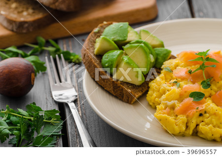 Salmon scrambled eggs and avocado toast Salmon scrambled eggs and avocado toast 39696557