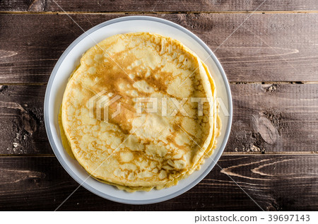 Pancakes with jam and blueberries 39697143