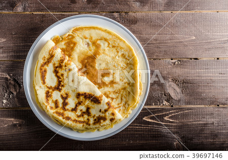 Pancakes with jam and blueberries 39697146