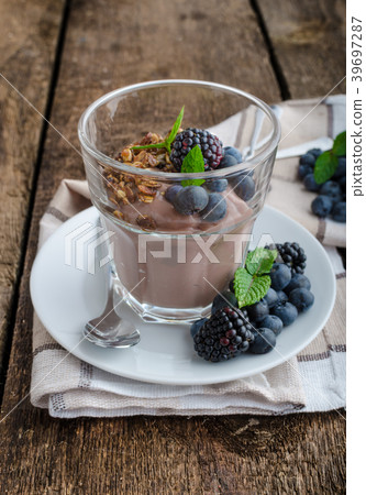 Chocolate pudding with berries Chocolate pudding with berries 39697287