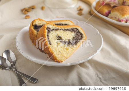 Poppy seeds cake and stuffed buns Poppy seeds cake and stuffed buns 39697618