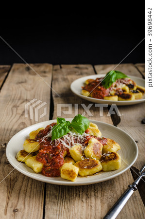 Homemade gnocchi with tomato sauce Homemade gnocchi with tomato sauce 39698442