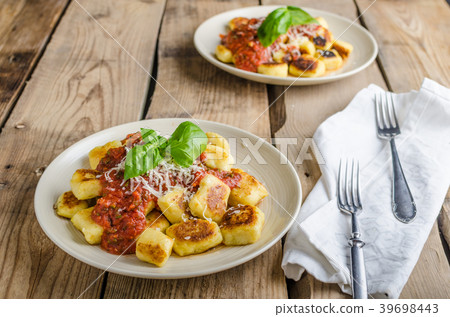 Homemade gnocchi with tomato sauce Homemade gnocchi with tomato sauce 39698443