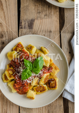 Homemade gnocchi with tomato sauce Homemade gnocchi with tomato sauce 39698446