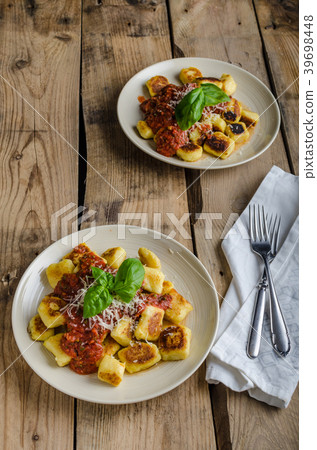Homemade gnocchi with tomato sauce Homemade gnocchi with tomato sauce 39698448