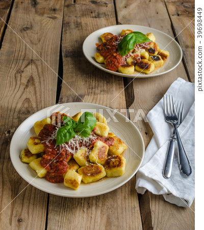 Homemade gnocchi with tomato sauce Homemade gnocchi with tomato sauce 39698449