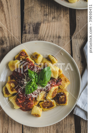 Homemade gnocchi with tomato sauce Homemade gnocchi with tomato sauce 39698451