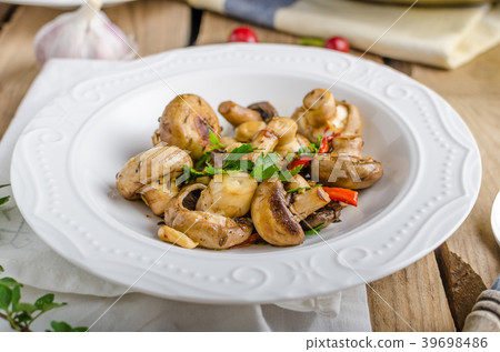 Fresh mushroom salad with chilli and herbs Fresh mushroom salad with chilli and herbs 39698486
