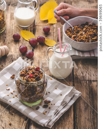 Home-baked granola with nuts, honey and pieces of fruit Home-baked granola with nuts, honey and pieces of fruit 39699065