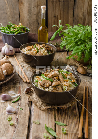 Chinese noodles with brown mushrooms 39699738