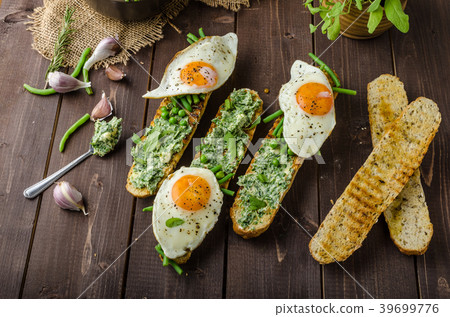 Baguette with herb butter Baguette with herb butter 39699776