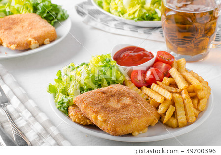 Fried cheese with french fries and lettuce Fried cheese with french fries and lettuce 39700396