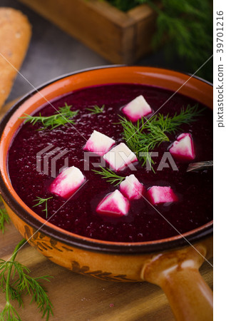 Beet soup with cheese and herbs 39701216