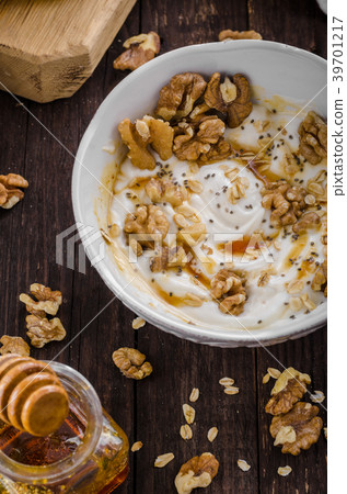 Fresh cheese with honey and walnuts Fresh cheese with honey and walnuts 39701217