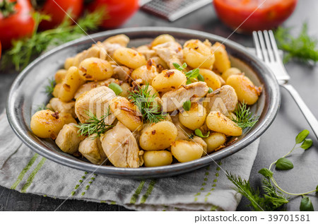 Fried gnocchi chicken curry Fried gnocchi chicken curry 39701581