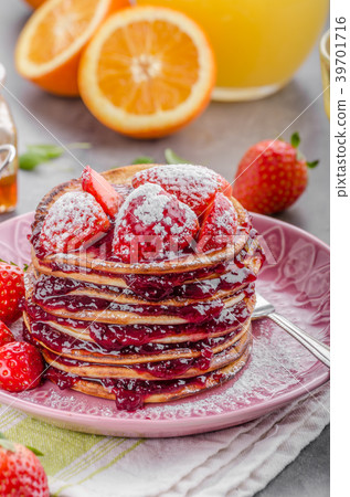 Pancakes strawberry, sugar and jam 39701716