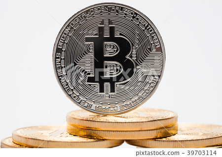 Stack concept of silver bitcoin on white backgrou Stack concept of silver bitcoin on white backgrou 39703114