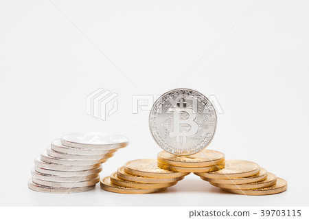 Stack concept of silver bitcoin on white backgrou Stack concept of silver bitcoin on white backgrou 39703115
