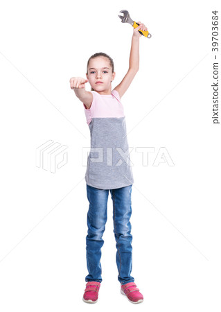 Child with wrench points with his finger 39703684