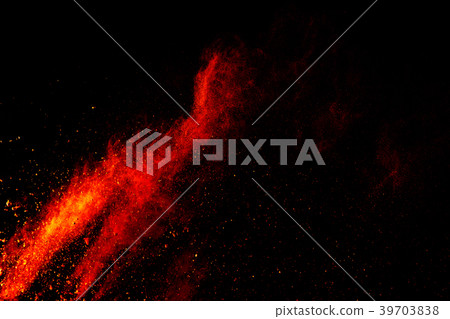 Redrange color powder explosion on  background. 39703838