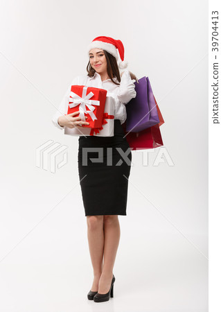 Christmas Concept - beautiful business woman Christmas Concept - beautiful business woman 39704413