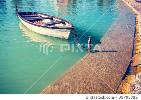 Landscape with lake and boat. Boat near pier 39705789