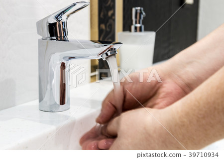 water faucet in the bathroom or toilet water faucet in the bathroom or toilet 39710934
