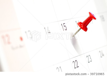 Embroidered red pins on a calendar on the 15th Embroidered red pins on a calendar on the 15th 39710965