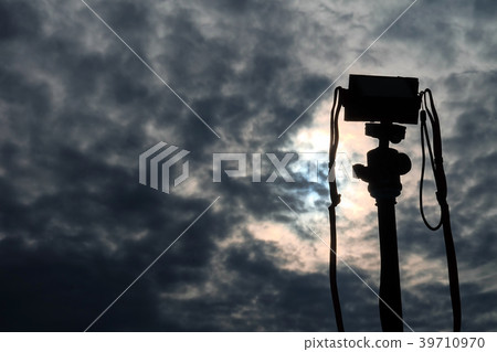 Silhouette Camera  on tripod on the morning sky 39710970