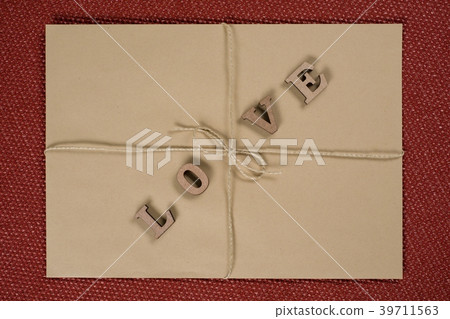 brown kraft envelope with the word love 39711563