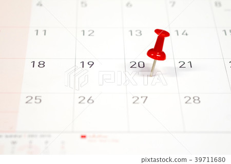 Embroidered red pins on a calendar on the 20th Embroidered red pins on a calendar on the 20th 39711680