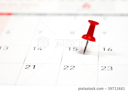 Embroidered red pins on a calendar on the 15th Embroidered red pins on a calendar on the 15th 39711681